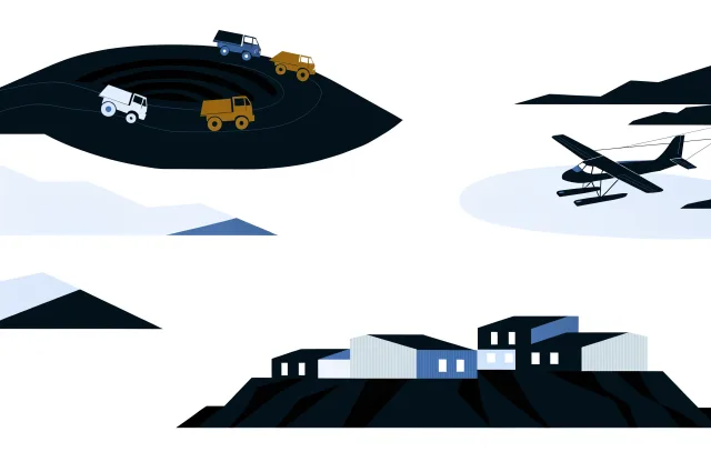 Diamond mine with haul trucks on the tundra, a float plane and low buildings in the Northwest Territories.